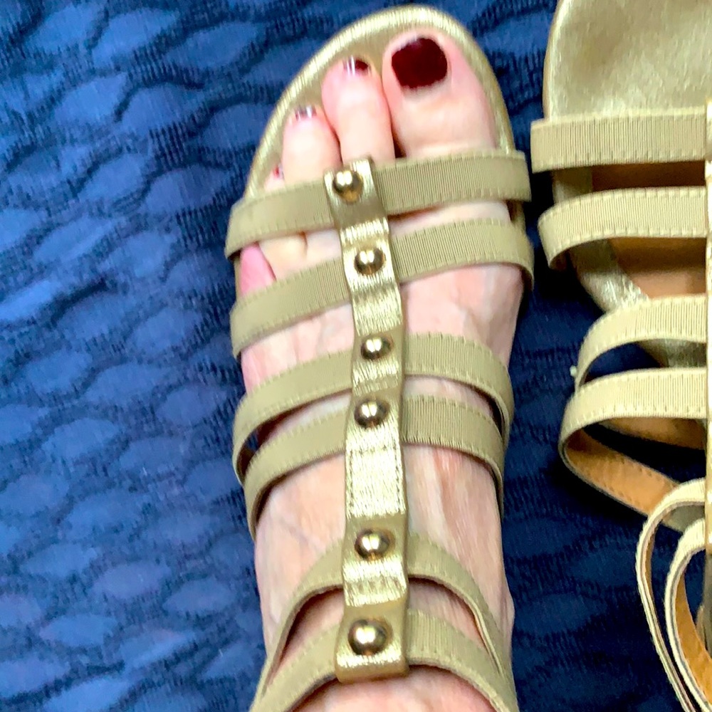 Gold Sandals with elastic straps. By Euro Soft